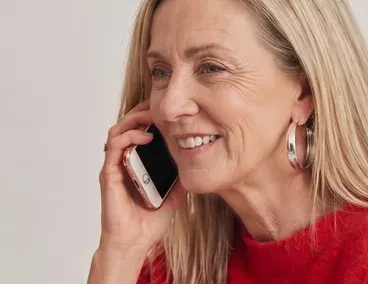 A woman speaking on her phone